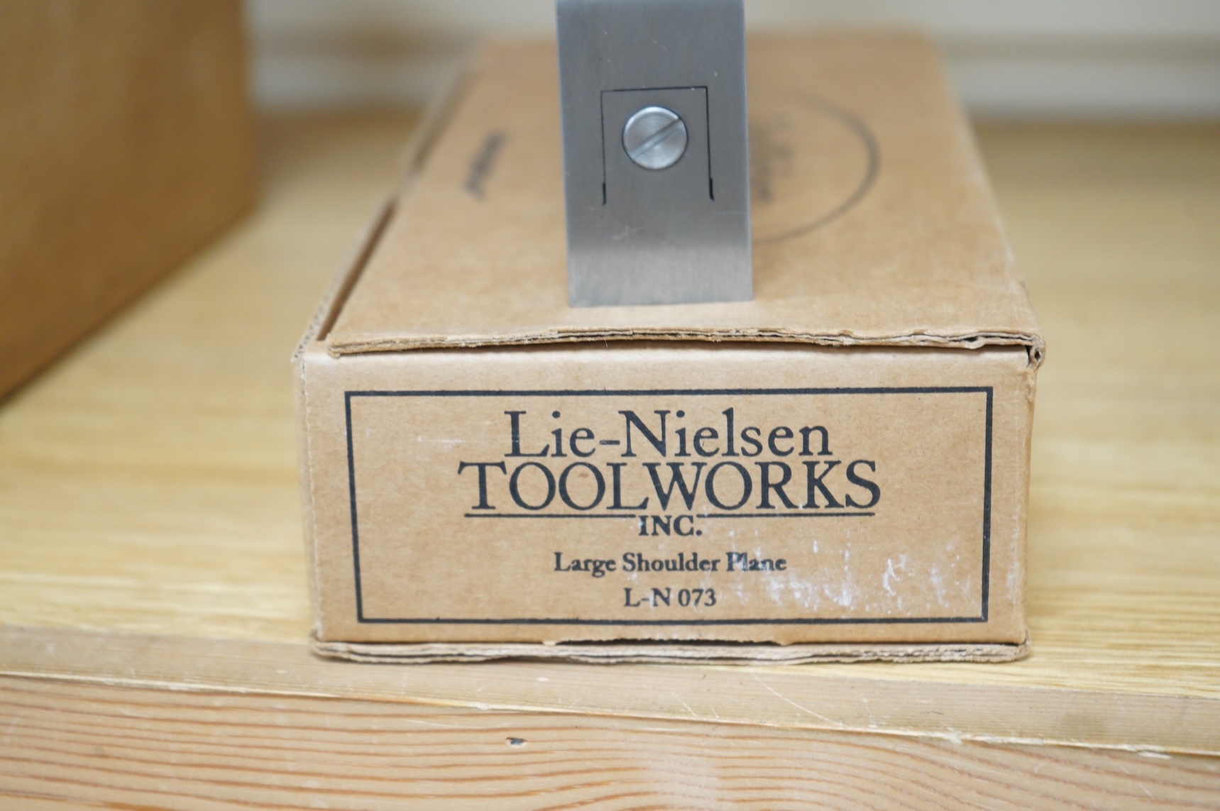 A boxed Lie-Nielsen Toolworks large shoulder plane (L-N 043) with paperwork